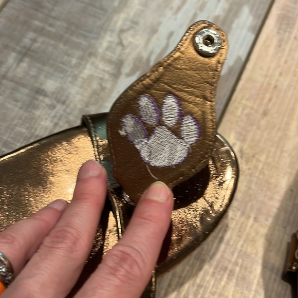 Never worn DBA gold wedges with removable purple tiger paw patches - Picture 5 of 6